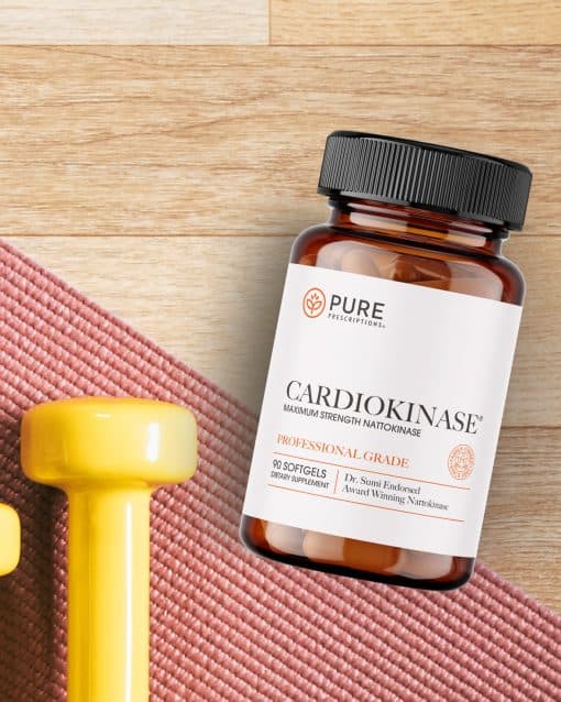 Flatlay of Cardiokinase with weights and a yoga mat.