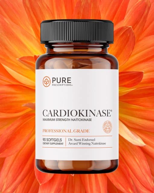 Bottle of Cardiokinase in front of an opened flower.