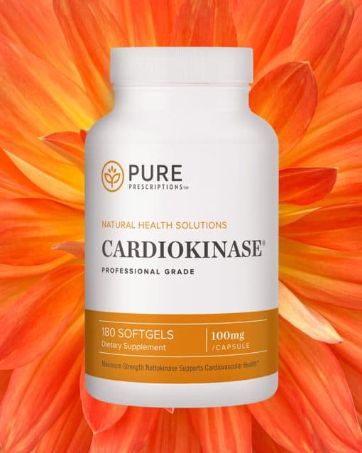 Bottle of Cardiokinase in front of an opened flower.