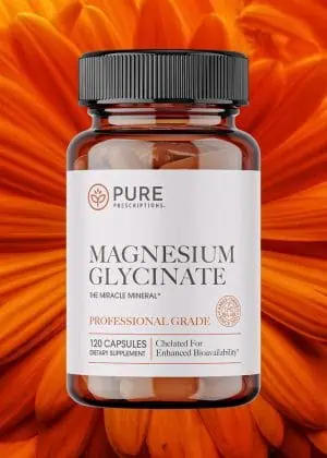 Magnesium Glycinate in front of a flower.