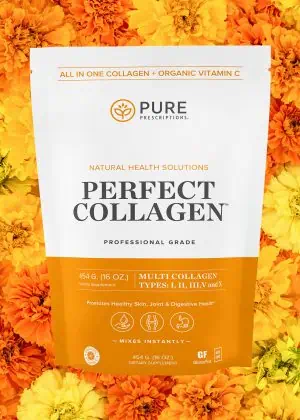 Perfect Collagen pouch against a bed of flowers.