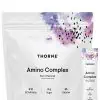 Thorne Amino Complex (30 Berry Stick Packs) - NSF Certified EAA and BCAA powder for muscle recovery and performance.